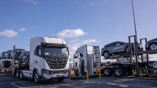 Nikola Electric Truck Hauling Nissan Cars (2023)