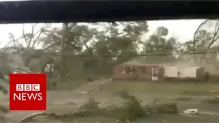 Watch US tornado rip roof from house - BBC News