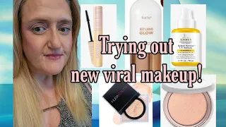 Trying out NEW viral makeup! #viralmakeup #tartecosmetics #Hudabeauty #natashadenona