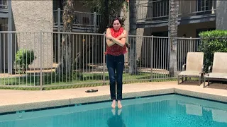 Linn Jumps In Pool Fully Clothed