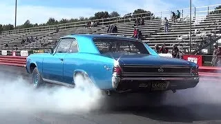 Insane Burnout !! 1970 Camaro SS396 vs 1967 Chevelle SS396 - 1/4 mile Drag Race Video - Road Test ®