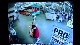 Video: Home Depot shoplifter drives off with worker on his car