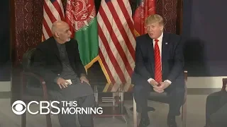 Trump makes first visit to Afghanistan, reopening peace talks with Taliban