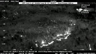 Massachusetts State Police Air Wing helicopter flies over Deerfield brush fire