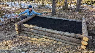 Filling our log raised garden bed HUGELKULTUR style