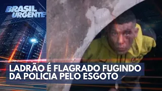 Ladrão é flagrado fugindo da polícia pelo esgoto