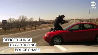 Officer clings to car during police chase | ABC News