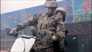 Special forces riding motorcycles, leading female soldiers out of the encirclement