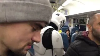 Homeless Stormtrooper asking for change on a train in London