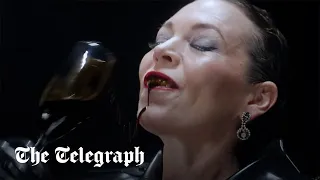 Olivia Colman poses as latex wearing oil executive in new campaign video