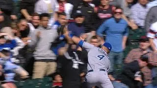 Gordon dives into the stands to make catch