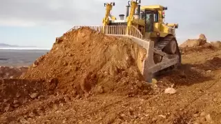 Caterpillar D11R pushing off dirt