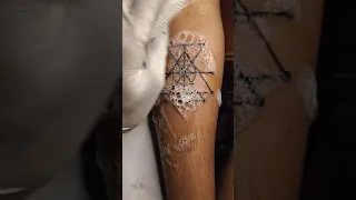 attract money tattoo geometric tattoo design