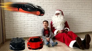 Mark and Santa Claus play with cars. Flying bugatti. Video for kids.