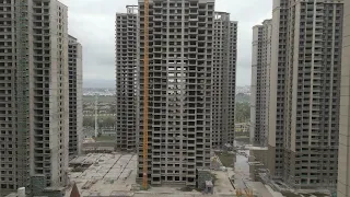 China's property market crisis: Homeowners forced to live in unfinished apartments • FRANCE 24