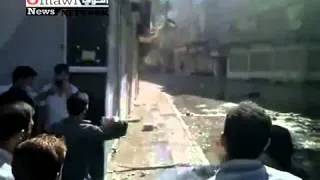 20110805 - Hama City - Umayyad - Brutal gunfire in a war-like street; protester hit