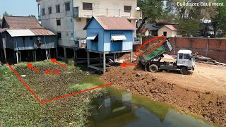 Video of pouring soil into the water next to to city to make it a 9x18 plot By Bulldozer Pushing