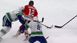 DeBrincat pulls off nasty snipe while falling down