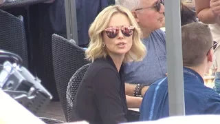 Charlize Theron is having lunch at restaurant the Martinez beach in Cannes