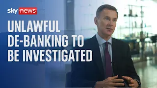 Unlawful 'de-banking' to be investigated as chancellor warns practice could be 'widespread'