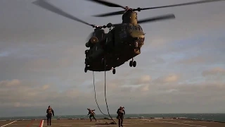 Royal Marines conduct board and search drills onboard HMS Albion