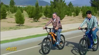 Turkmenistan's president goes for a bike ride with his grandson