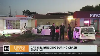 Two vehicles collide, sending one into an Oakland Park building