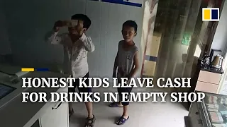 Trustworthy kids show banknotes to security camera while shopkeeper is away