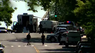 Bomb threat suspect in DC surrenders to police after hours-long standoff