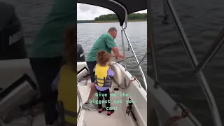 Little girl freaks out when she catches a really big fish!