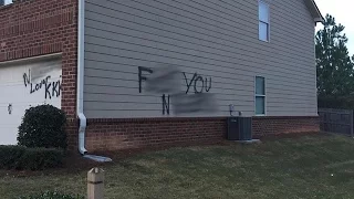 Racial slurs painted on home