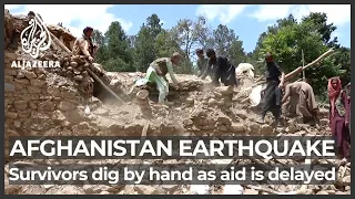 Afghanistan earthquake survivors dig by hand as aid is delayed