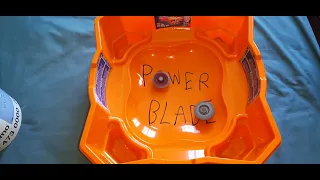 Batallas de Beyblades Metal en Estadio naranjo de Burst Rise