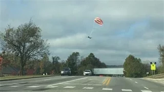 Former Wal-Mart CEO Lands Plane With Parachute