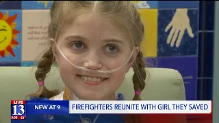Firefighters reunited with girl they saved