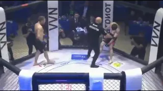 Russian MMA fighter turned into zombie standing stiff against the cage - KO Punch - Knock Out