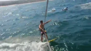 Kite surfing with dolphins