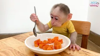 Monkey Lily enjoys a healthy breakfast made by dad