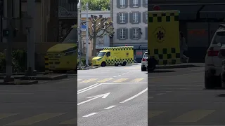 Yellow ambulance responding in Geneva