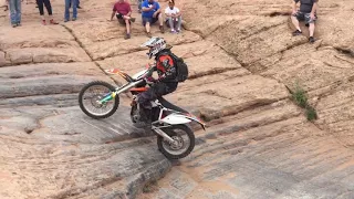 Dirt bikes riding up Hell's Gate in Moab, Utah. 2nd  motorcycle almost crashes - Enduro