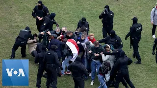 Black-Clad Masked Police Disperse Demonstrators at Belarus Protest