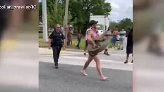 Man wrestles gator with bare hands, came from hockey game