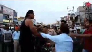 Strong and big guy fight with police officer