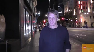 Tony Hawk shows off his autographed Bauhaus skateboard outside Katsuya in Hollywood