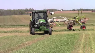 2016 First Cut of Hay:  CLAAS 1750 Liner Raking Hay