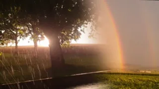 Sun, rain and rainbow