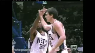 Nenad Krstic feeds Jason Collins from the floor for the 3-point play