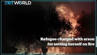 Refugee who set herself on fire in Greece's Lesvos is charged with arson