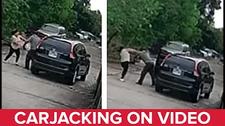 Woman pulled from vehicle in violent carjacking caught on video