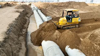 New Action!! Small Komatsu Bulldozer Pushing Sand Filling a Drains